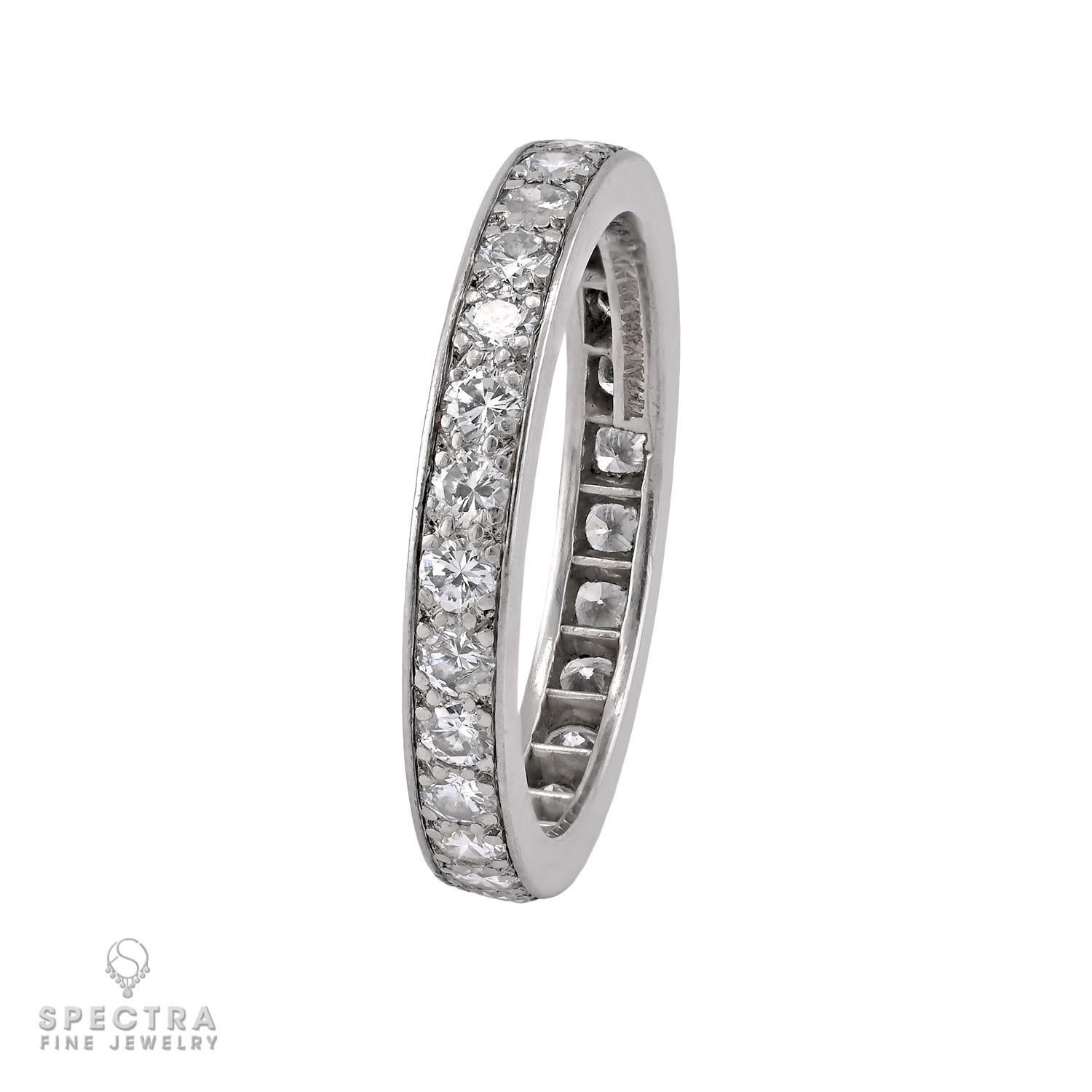 Celebrate the promise of forever with this exquisite Tiffany & Co. diamond wedding band. Expertly crafted in luxurious platinum, this timeless ring is designed to dazzle. 
A single row of channel-set round diamonds, totaling approximately 1.01