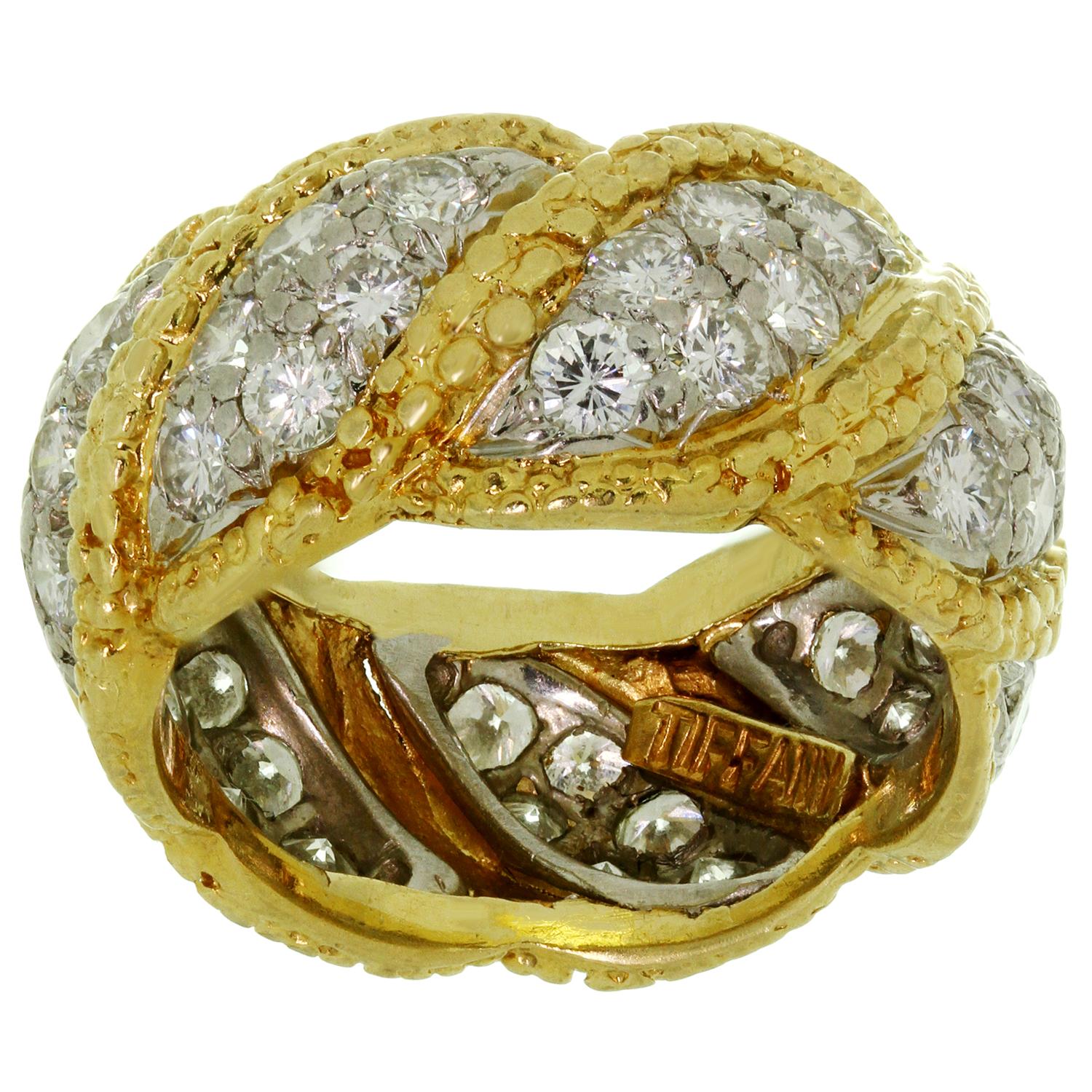 This fabulous vintage Tiffany & Co. ring is crafted in 950 platinum & 18k yellow gold and pave-set with brilliant-cut round F-G VVS2-VS1 diamonds weighing an estiamted 2.0 carats. Made in United States circa 1980s. Measurements: 0.43