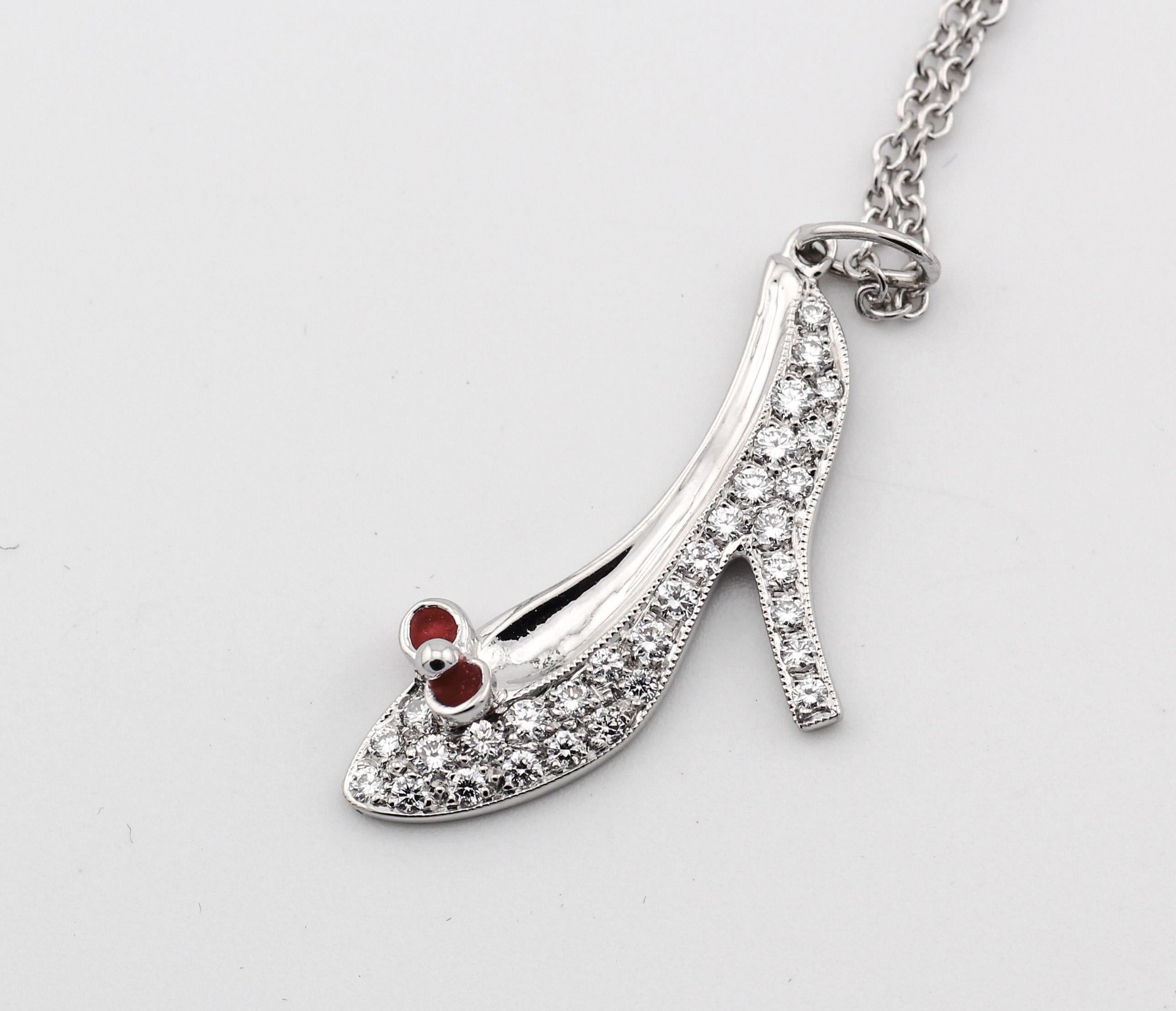 The Tiffany & Co. Diamond Red Enamel Platinum High Heel Shoe Charm Pendant Necklace is a striking fusion of glamour and whimsy, capturing the essence of timeless elegance with a playful twist. Crafted by the renowned luxury jeweler Tiffany & Co.,