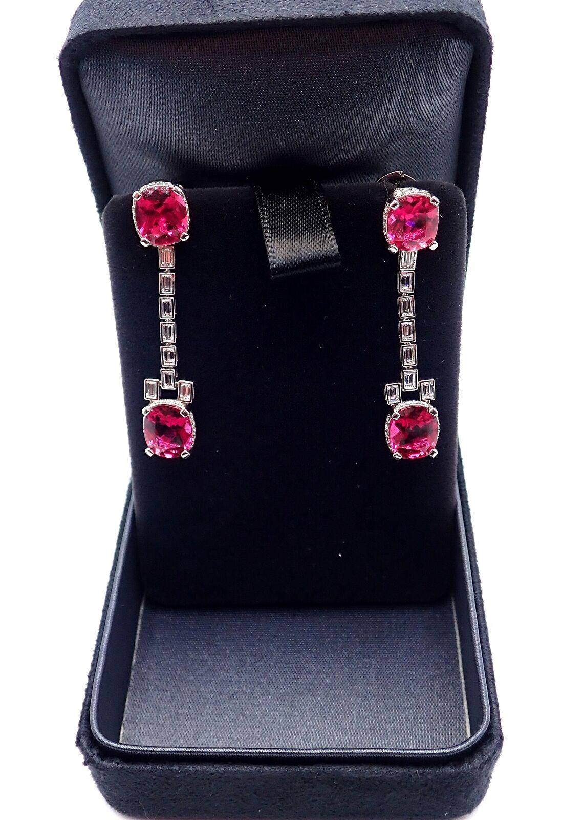Platinum Diamond Rubellite Drop Earrings by Tiffany & Co. 
With 60 round brilliant cut diamonds - VS1 clarity, E color total weight approximately .36ct
16 emerald cut diamonds VS1 clarity E color total weight approximately .96ct
4 oval cut rubellite