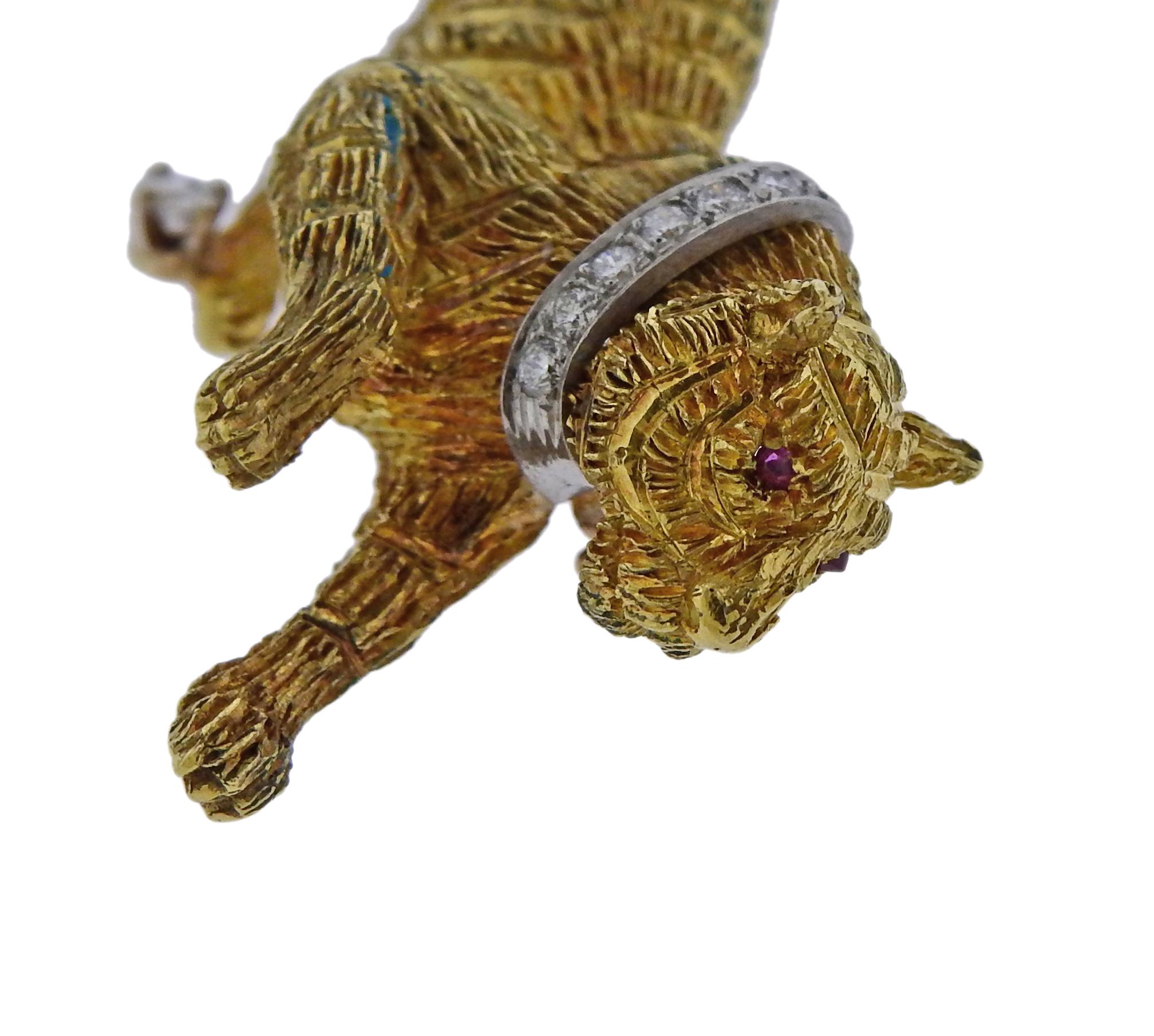 18k gold tiger brooch, set with ruby eyes and diamond color, set with approx. 0.12ctw in G/VS diamonds. Crafted by Tiffany & Co, Comes with a copy of original purchase receipt. Brooch is 50mm x 26mm and weighs 16.4 grams. Marked Tiffany & Co, 18k.  