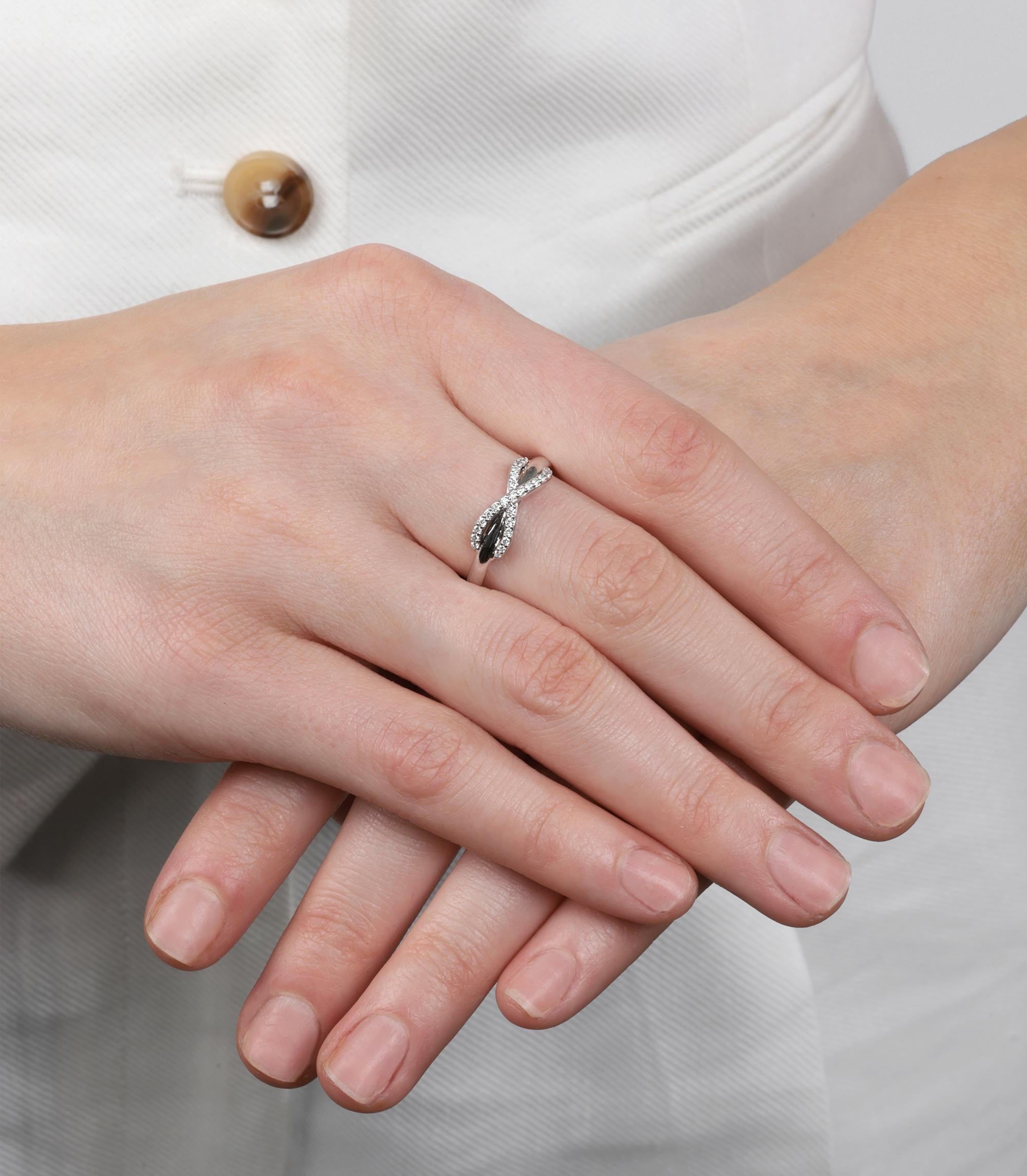Tiffany & Co. Diamond Set 18ct White Gold Infinity Ring

Brand- Tiffany & Co.
Model- Infinity Ring
Product Type- Ring
Accompanied By- Tiffany & Co Box
Material(s)- 18ct White Gold
Gemstone- Diamond
UK Ring Size- N
EU Ring Size- 53.5
US Ring Size-