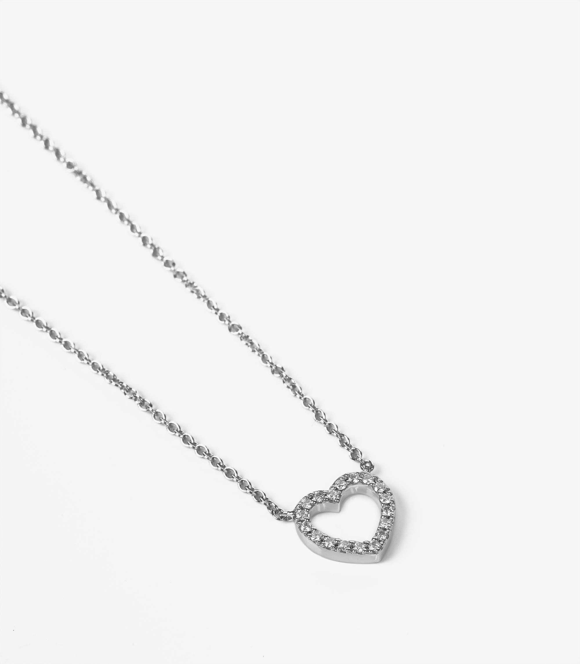 Tiffany & Co. Diamond Set 18ct White Gold Mini Metro Heart Pendant

Product Details
Xupes Ref: J1490
Brand: Tiffany & Co.
Model:  Metro Heart Pendant
Type: Pendant
Accompanied By: Tiffany & Co. Box, Outer Box
Material(s): 18ct White Gold
Gemstone: