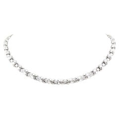 Tiffany
Co. Collar Signature X de diamantes