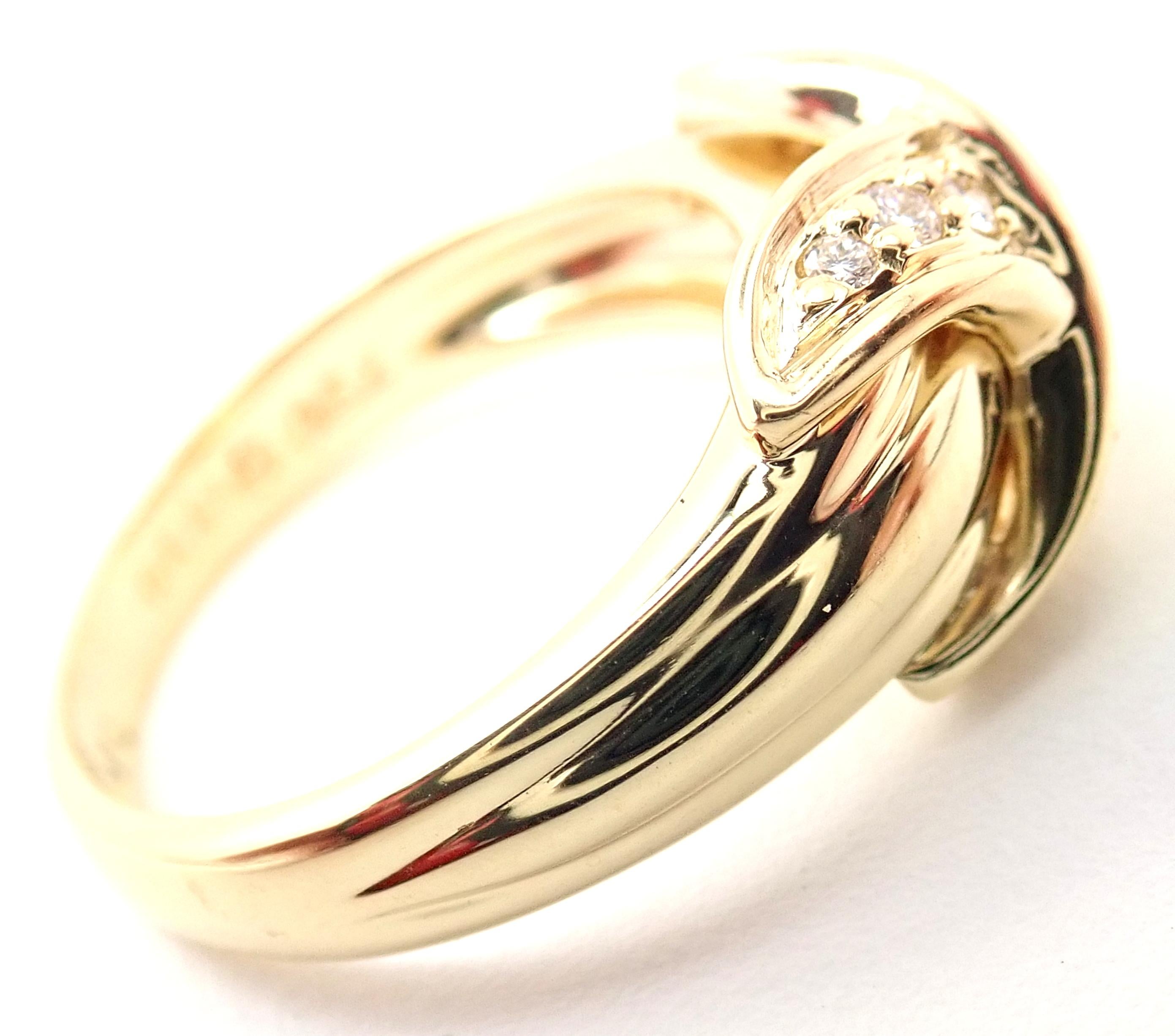 18k Gelbgold Diamant X Band Ring von Tiffany & Co.
Mit 14 runden Diamanten im Brillantschliff, Reinheit VS1, Farbe G, Gesamtgewicht ca. 0,50ctw
Einzelheiten: 
Ring Größe: 5 3/4
Gewicht: 6,9 Gramm
Breite: Die obere Breite beträgt 10 mm
Gestempelte