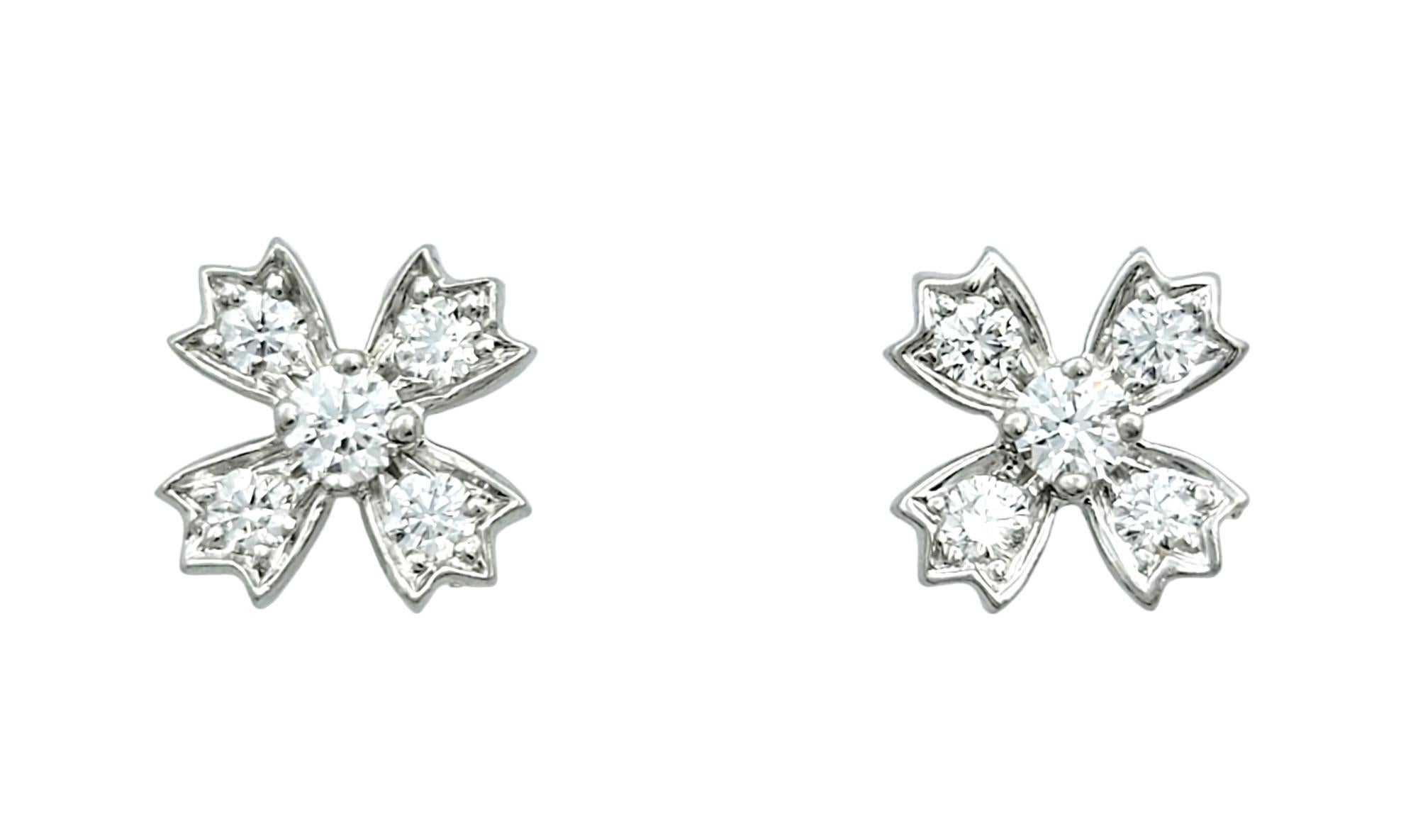 These exquisite stud earrings, crafted in platinum and hailing from the renowned Tiffany & Co., epitomize timeless elegance with a touch of wintry enchantment. The delicate snowflake motif gracing each earring is a testament to both intricate design