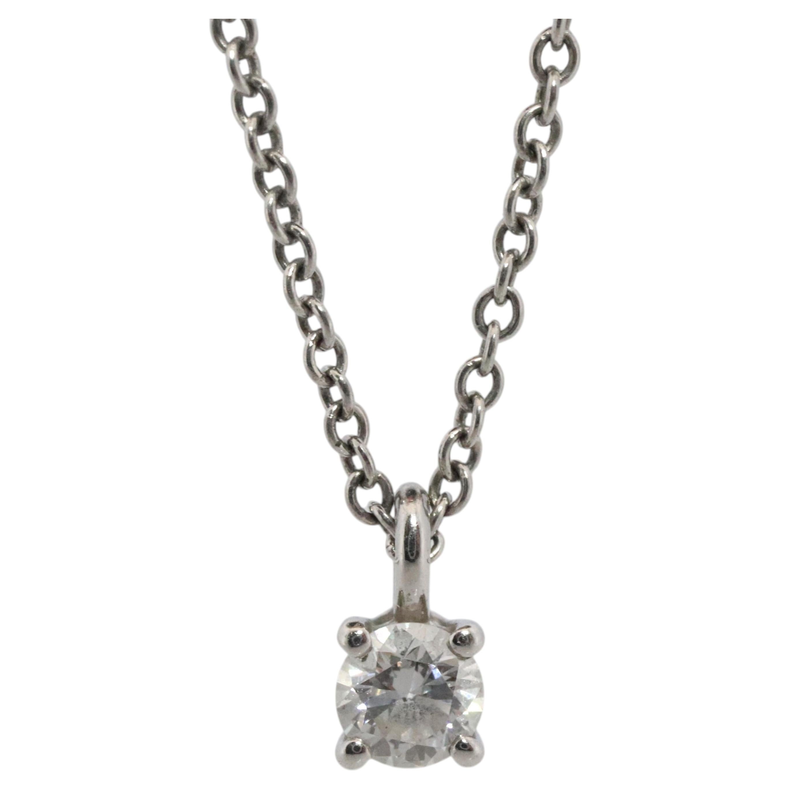 Tiffany Co Diamond Solitaire Necklace. Platinum 0.15ct Diamond Pendant.
