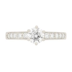 Tiffany & Co. Diamond Solitaire Ring with Diamond Shoulders