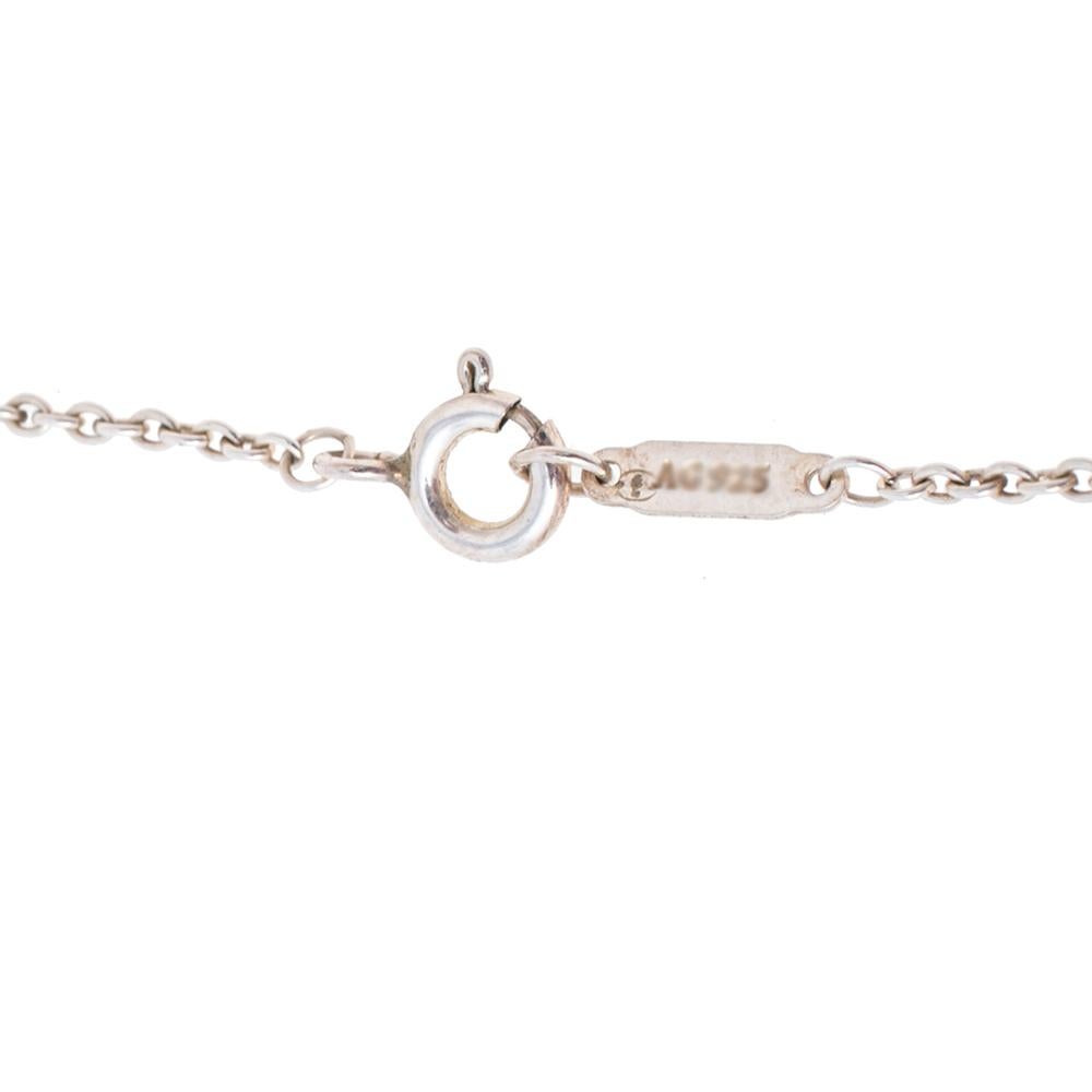 Contemporary Tiffany & Co. Diamond Sterling Silver Daisy Key Pendant Necklace