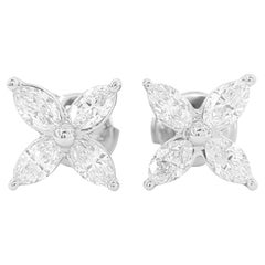 Boucles d
oreilles en diamant Tiffany
Co.