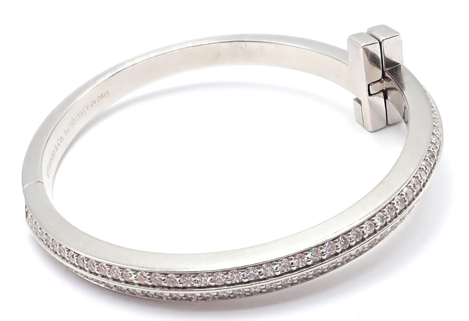 Tiffany & Co Diamond T1 Wide Hinged White Gold Bangle Bracelet In Excellent Condition For Sale In Holland, PA