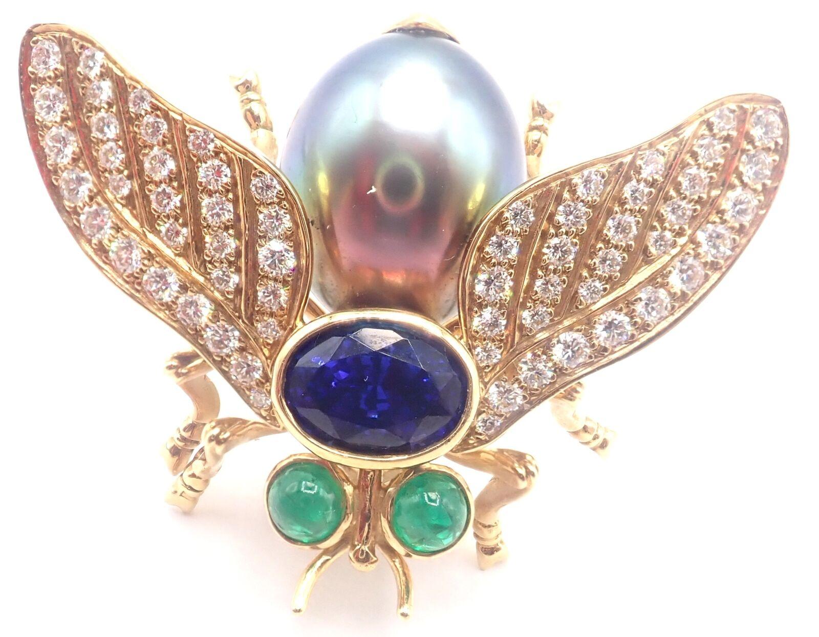 18k Yellow Gold Diamond Tahitian Pearl Tanzanite Emerald Fly  Brooch Pins by Tiffany & Co. 
With 62 round brilliant cut diamonds VS1 clarity, G color total weight approximately .75ct
2 Cabochon emeralds
Tahitian pearl 13mm
Details: 
Measurements: