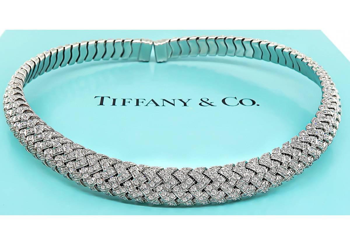 This stunning platinum Vannerie choker necklace by Tiffany & Co. features an amazing woven motif design and is set with high quality sparkling round cut diamonds that weigh approximately 18.00 carat graded E-F color with VS clarity.



Inventory