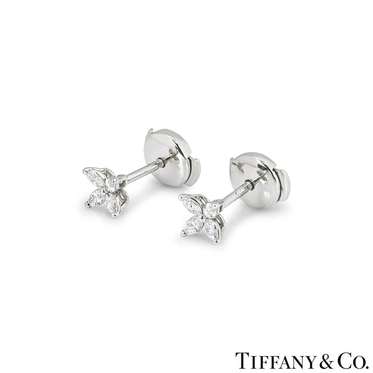 A pair of platinum earrings from the Victoria collection by Tiffany & Co. Each earring is set with 4 marquise cut diamonds in a claw setting, with a total weight of 0.19ct. The earrings feature post and alpha back fittings and are the mini size. The