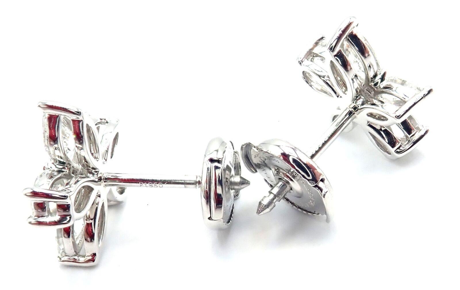 Platinum Victoria Diamond  Mixed Cluster Large Earrings by Tiffany & Co. 
With Marque shape diamonds VS1 clarity, E color total weight approximately .93ct
Pear shape diamonds VS1 clarity, E color total weight approximately .84ct
These earrings come
