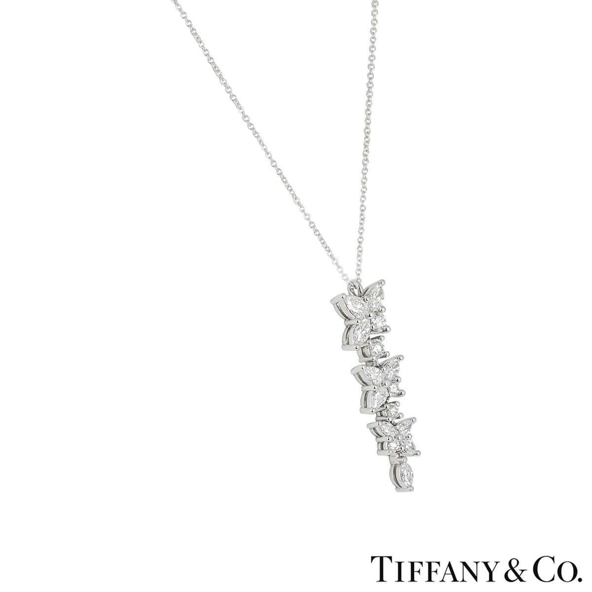 A stunning diamond pendant in platinum from the Victoria collection by Tiffany & Co. The cluster pendant consists of 6 marquise cut diamonds totalling 0.83ct, 4 pear cut diamonds totalling 0.74ct and 5 round brilliant cut diamonds totalling 0.55ct.