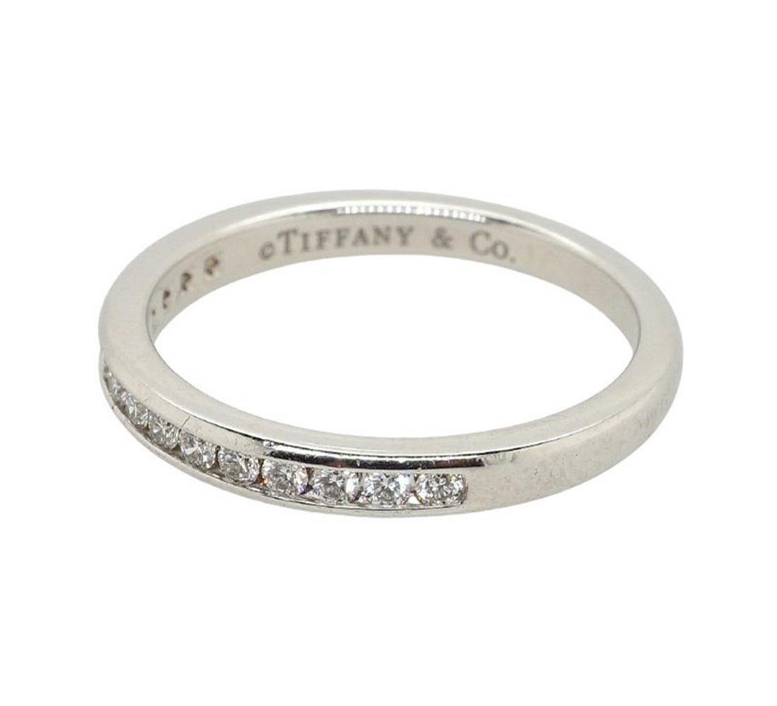 Band Ring In Platinum With A Half Circle Of Round Brilliant Diamonds. 2.5 Mm Wide.

Finger Size - I
Carat Total Weight: 0.24Ct
Total Diamond Weight: 0.24Ct  
Markings: Pt950
Condition: Excellent - Refer Images 