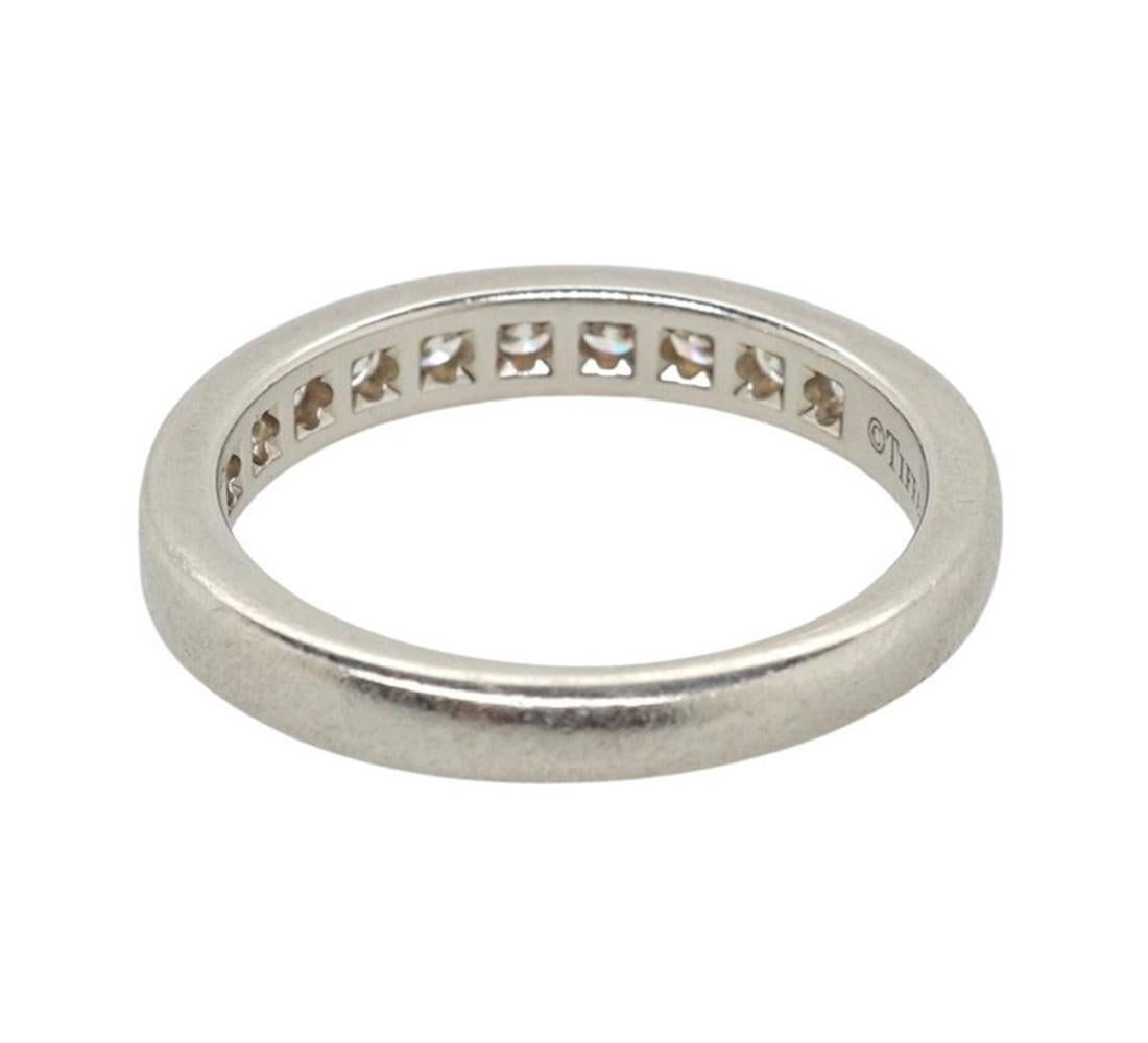 Band Ring In Platinum With A Half Circle Of Round Brilliant Diamonds. 3 Mm Wide

Total Diamond Weight: 0.33Ct

Finger Size - J

Markings: 950 

Condition: Excellent - Refer Images 