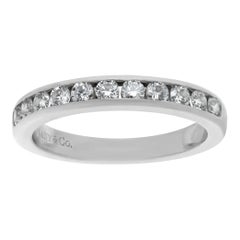 Vintage Tiffany & Co. diamond wedding band in platinum with a half-circle of diamonds