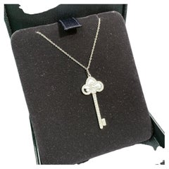 Tiffany & Co. Diamond White Gold Fleur de Lis Key Pendant Necklace Medium