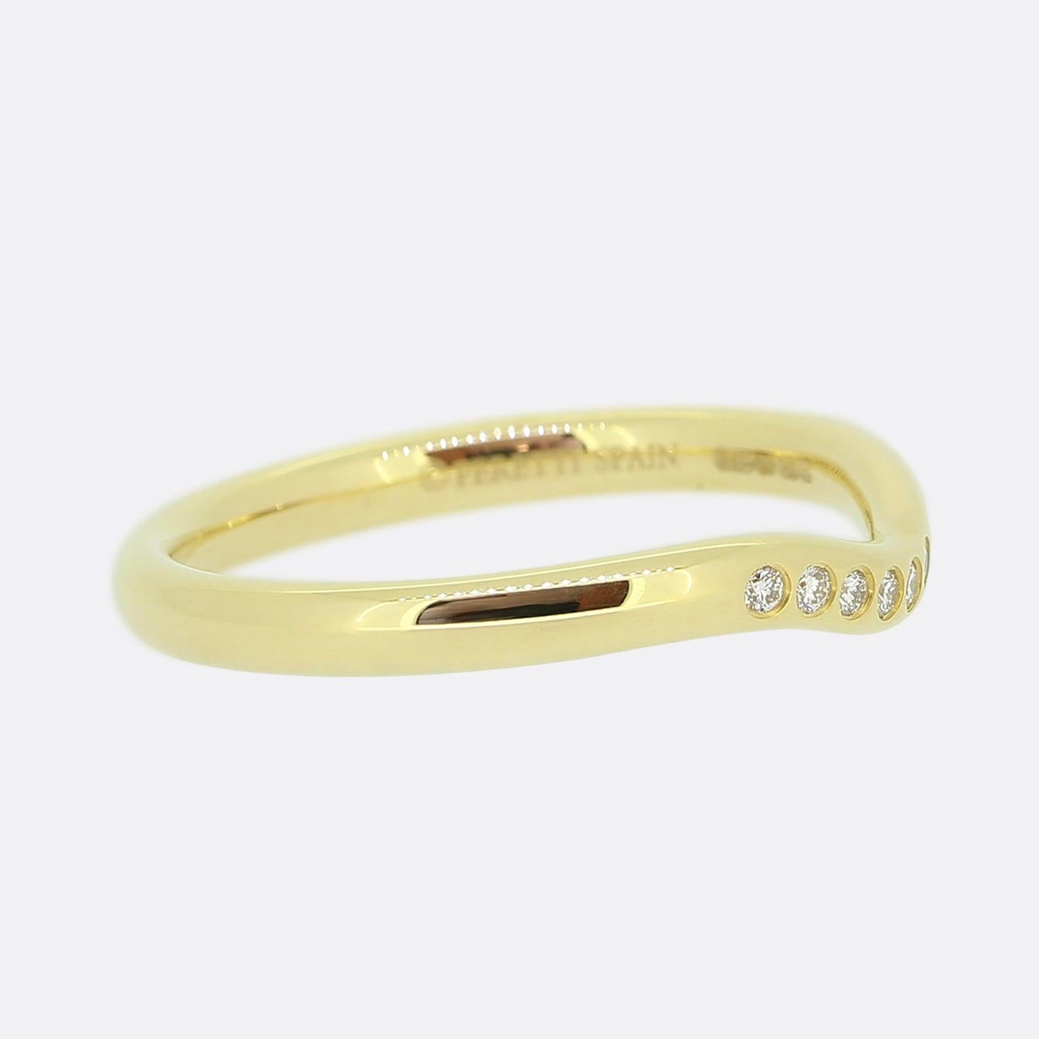 Here we have a classic diamond wishbone ring from the world renowned jewellery designer, Tiffany & Co. This piece forms part of an Elsa Peretti collection and showcases a 'V' shaped head which plays host to nine rub-over set round brilliant cut