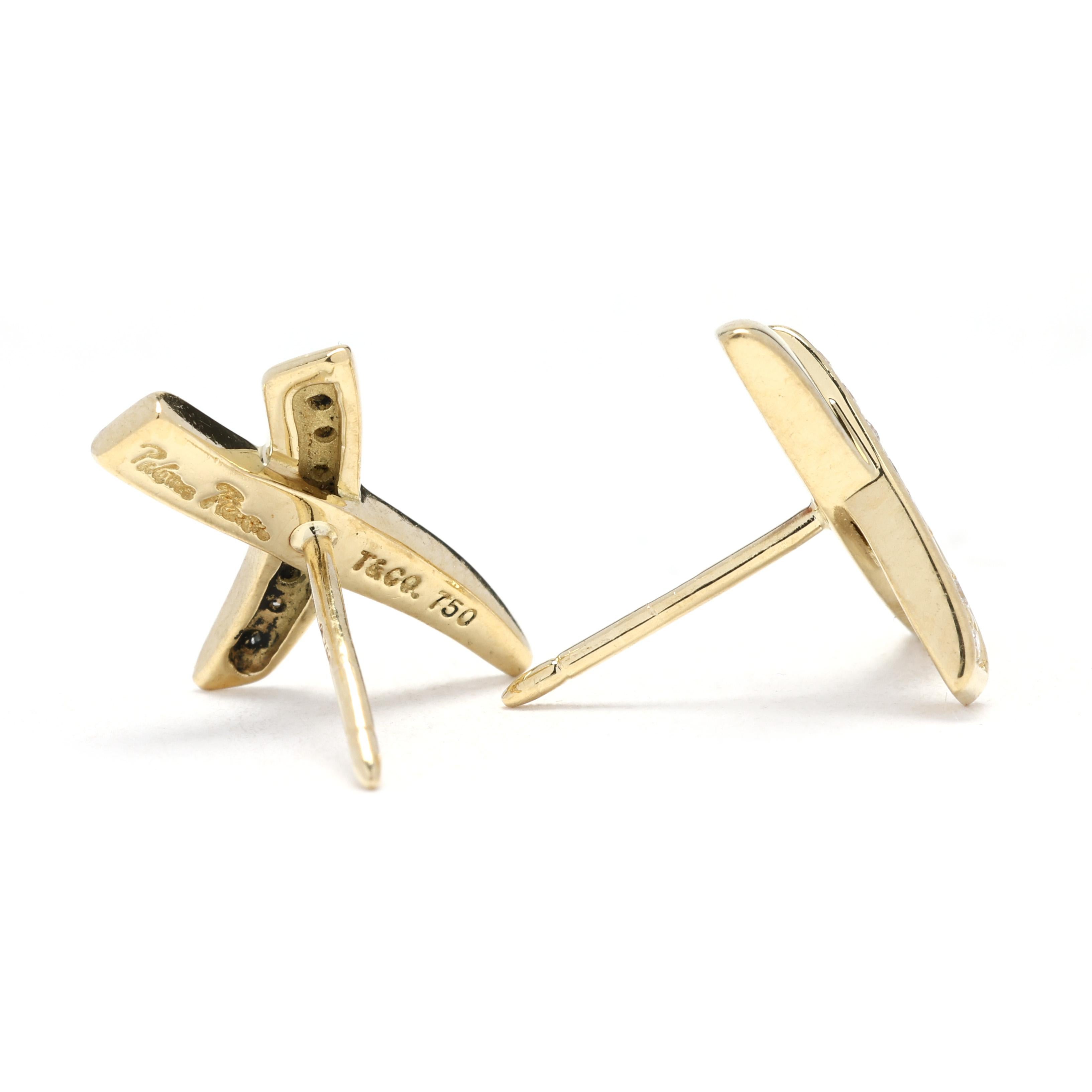 These Paloma Picasso diamond X studs are a stunning pair of statement earrings that will elevate any look. Made from 18k yellow gold, these earrings feature a unique design with a diamond-encrusted X shape. The diamonds add a touch of sparkle and