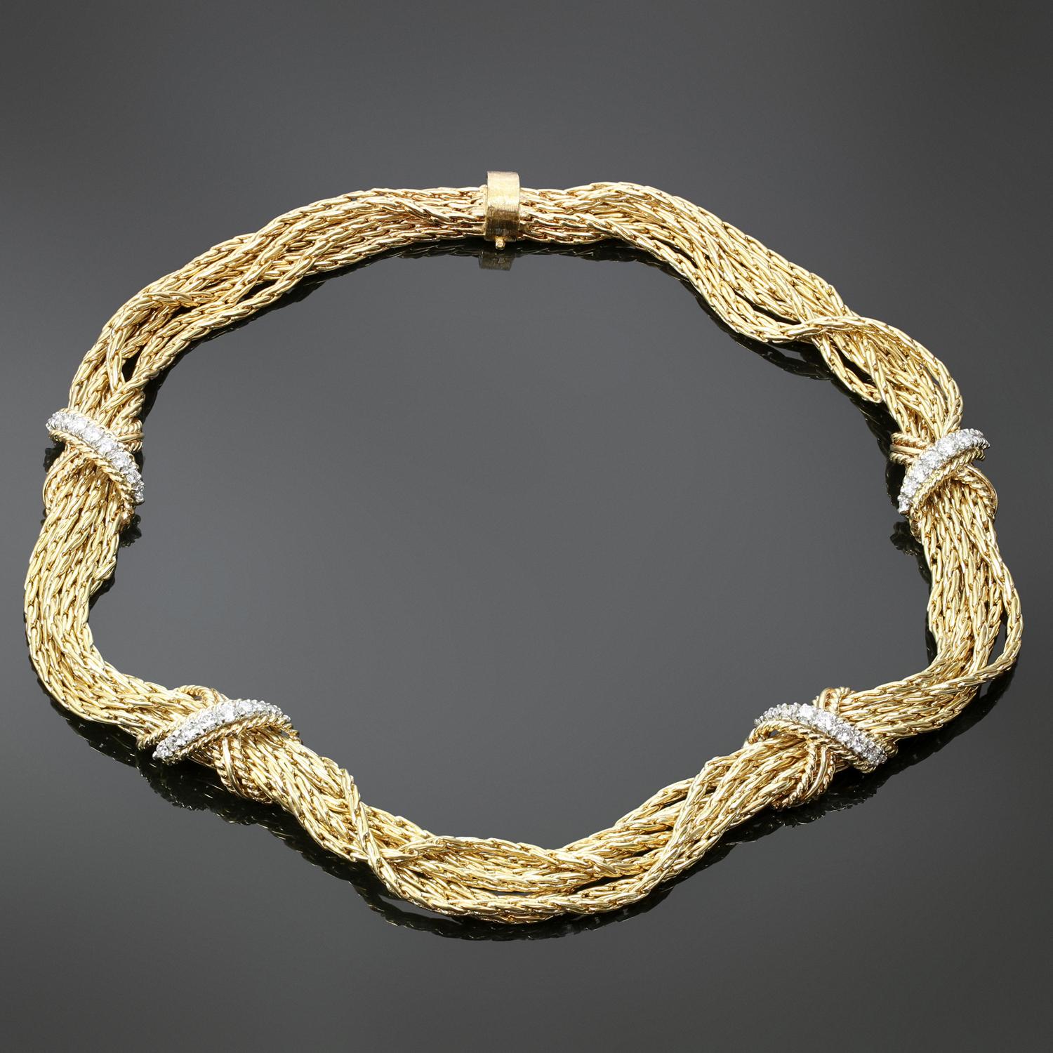 This rare and authentic Tiffany multi-strand necklace features a 7-row rope design crafted in 14k yellow gold and accented with four X elements set with 36 brilliant-cut round diamonds in white gold, weighing an estimated 1.20 carats. Made in United