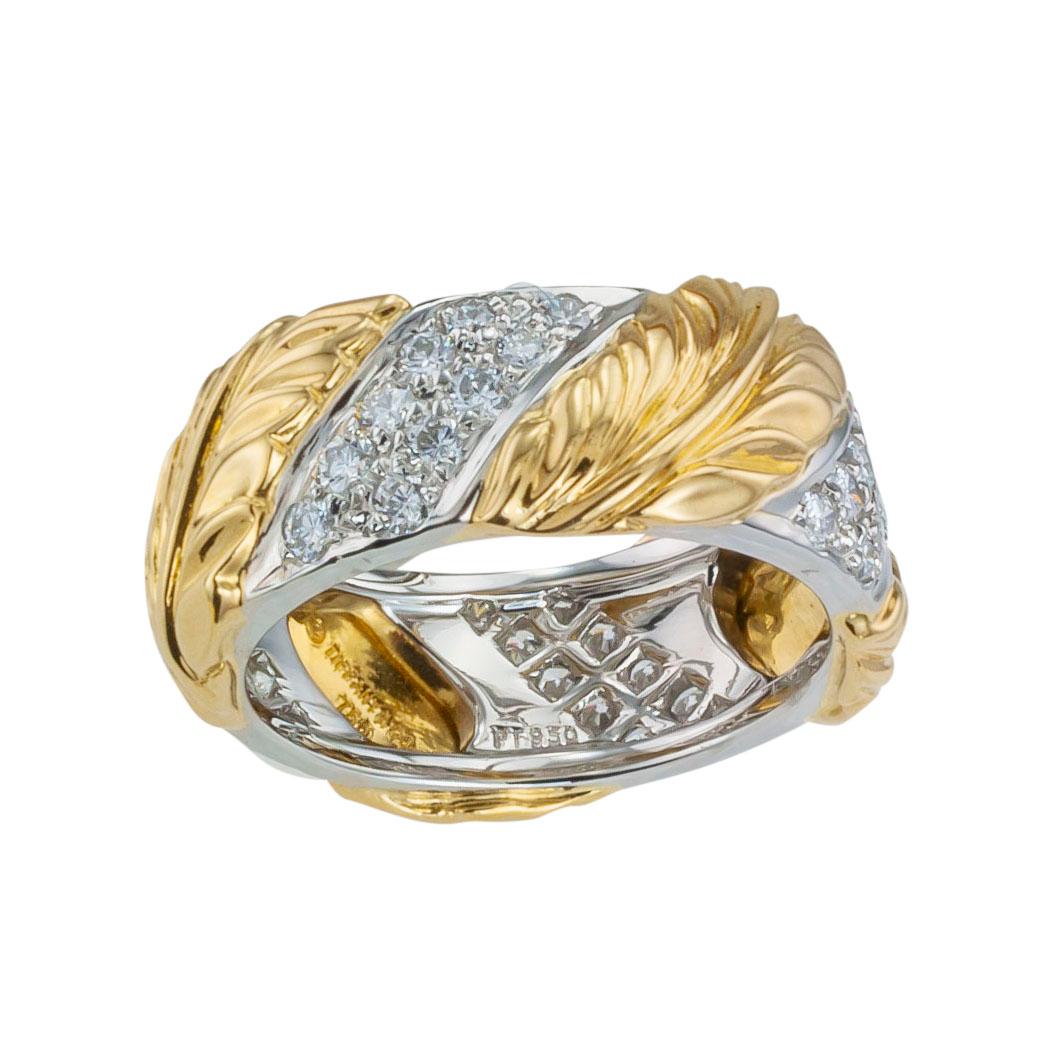 Tiffany & Co diamond yellow gold platinum wedding band.  Love it because it caught your eye, and we are here to connect you with beautiful and affordable jewelry.  Celebrate Yourself!  Simple and concise information you want to know is listed below.