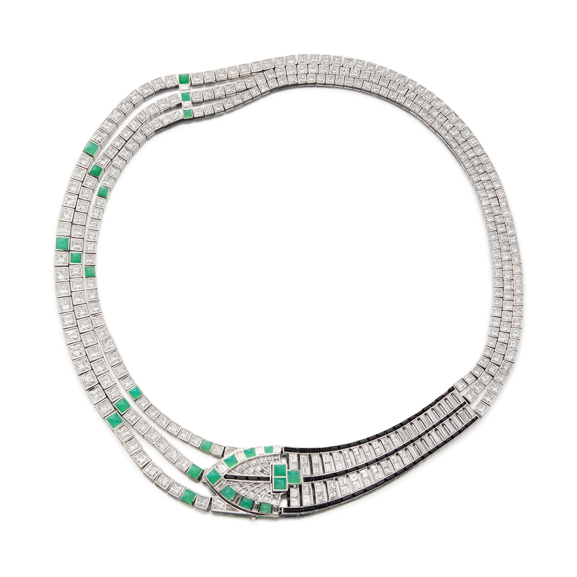 Tiffany & Co. Diamond,Chrysoprase, and Spinel Necklace This necklace has a
flexible design set to the front with a leaf motif, set throughout with square-cut and baguette diamonds (weighing approx. 47.35 carats, Color: F/G, Clarity: VS), accented at