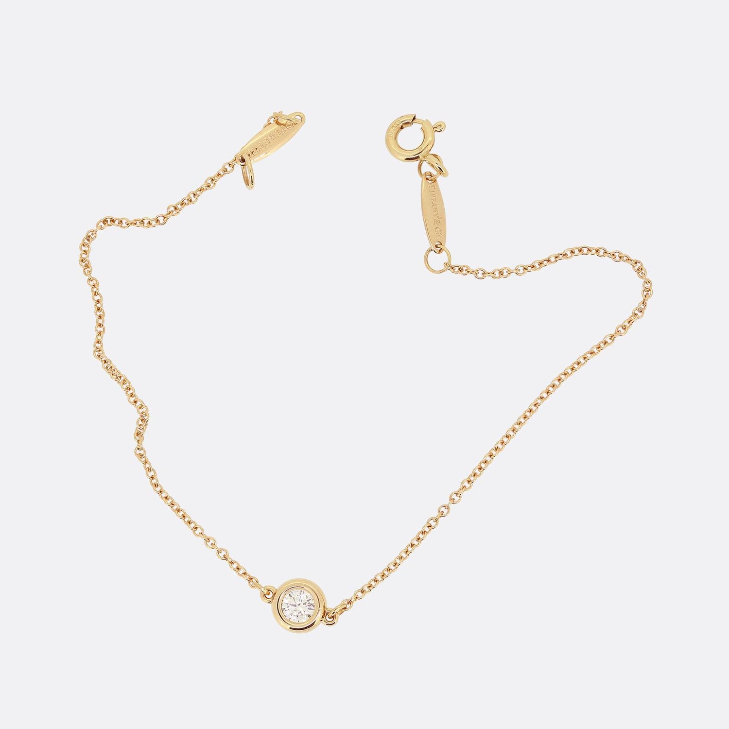 Here we have a classic 'Diamonds by the Yard' bracelet from the world renowned luxury jewellery designer, Tiffany & Co. A slim 18ct rose gold belcher chain plays host to a single scintillating rub-over set 0.14ct round brilliant cut diamond which is