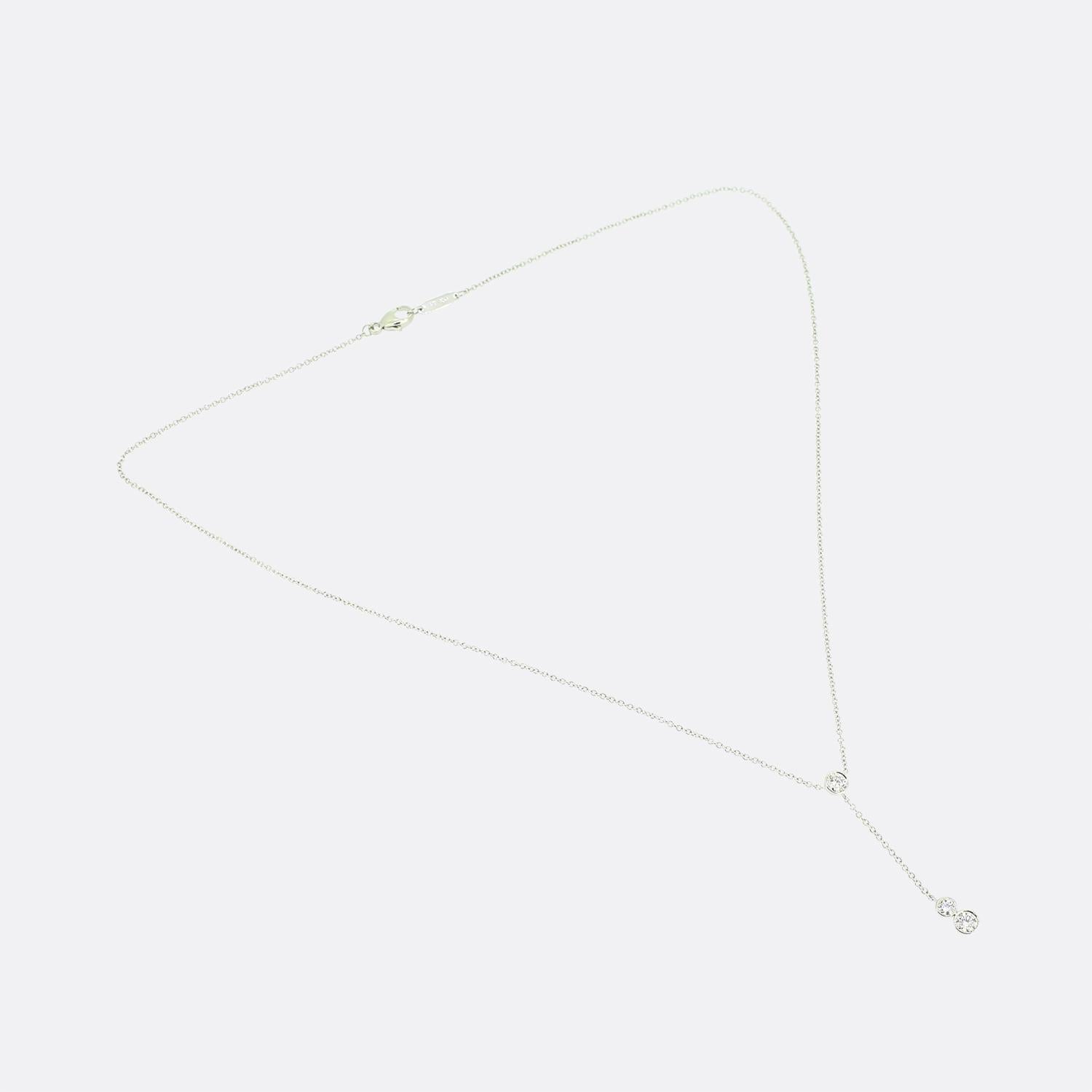 Here we have a simple yet elegant platinum necklace from the world renowned jewellery designer, Tiffany & Co. A single round brilliant cut diamond sits at the bottom of the necklace with two further diamonds sitting on a drop pendant below. This