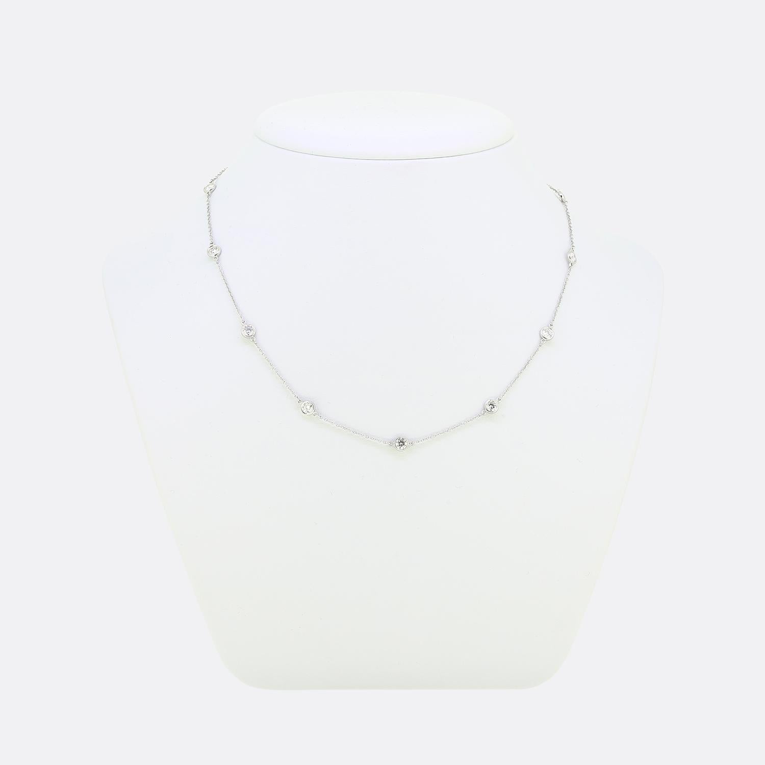 Here we have glorious necklace from the world renowned jewellery designer, Tiffany & Co. A slim platinum belcher chain plays host to 11 evenly spread, individually rub-over set round brilliant cut diamonds.

This is one of Elsa Peretti's original