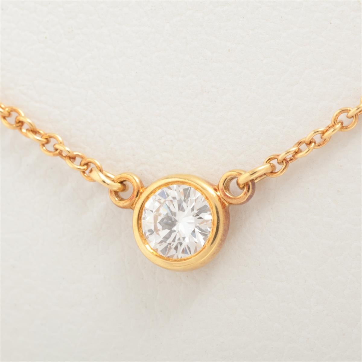The Tiffany & Co. Diamonds by the Yard Necklace in gold is a stunning and versatile piece of jewelry that embodies the brand's legacy of luxury and craftsmanship. Crafted from high-quality gold, the necklace boasts a warm and radiant hue that