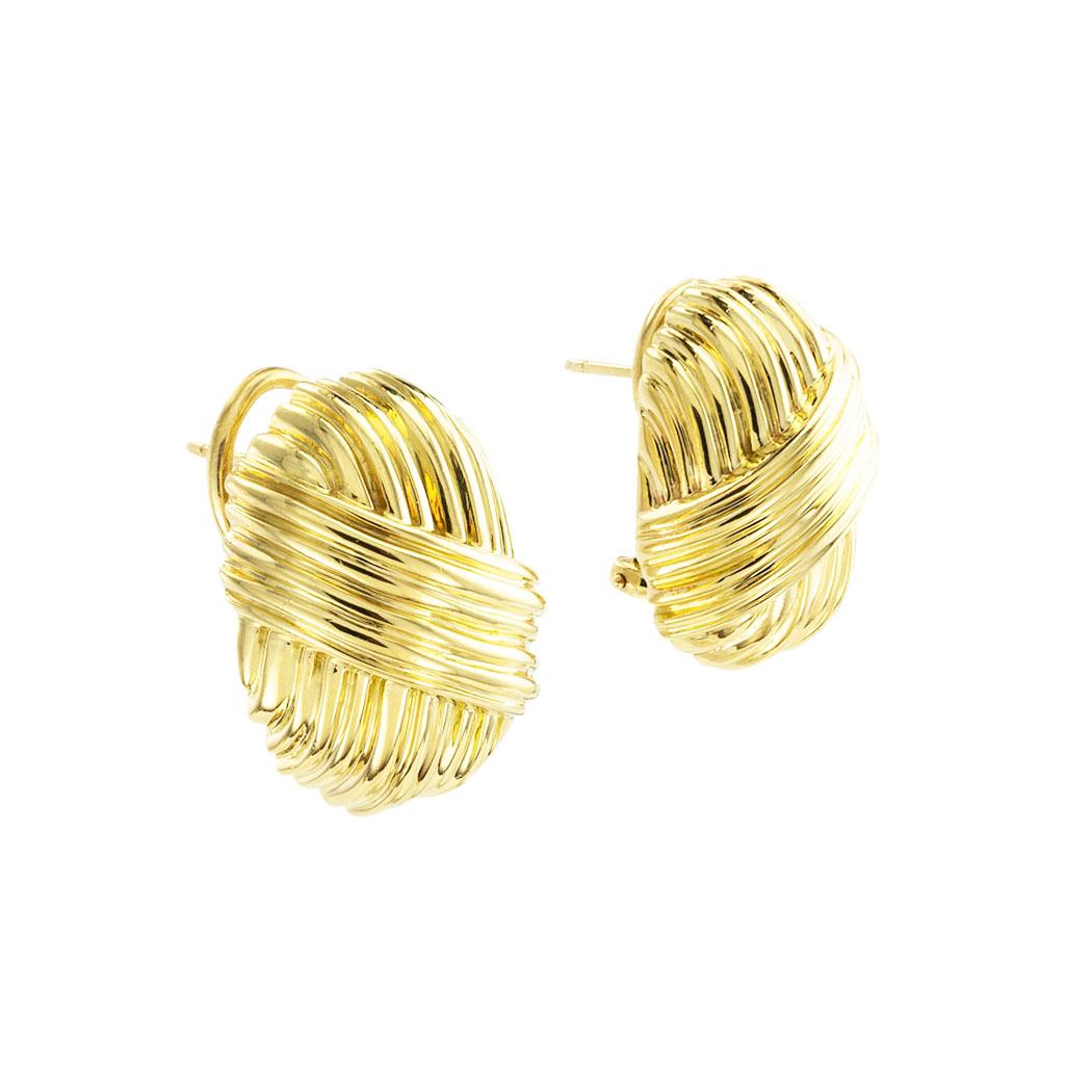 Tiffany & Co fluted yellow gold clip-on earrings circa 1980. *

ABOUT THIS ITEM:  #E-DJ622D. Scroll down for detailed specifications.  The name Tiffany & Co right away inspires confidence in the notion that you are getting the finest workmanship,