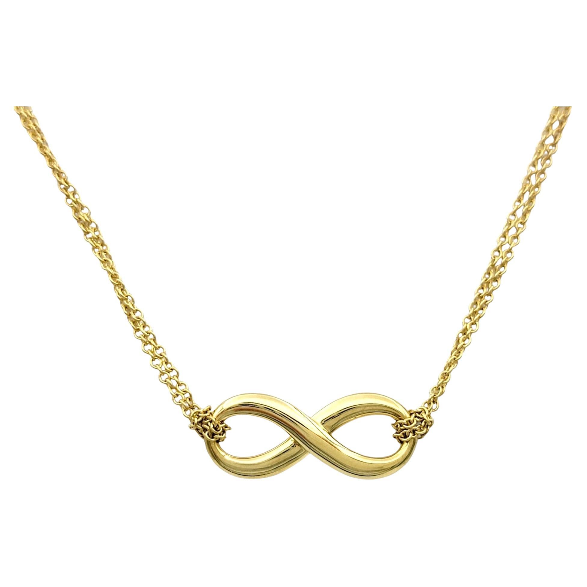 Tiffany & Co. Double Chain Infinity Pendant Necklace Set in 18 Karat Yellow Gold For Sale