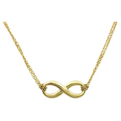 Tiffany & Co. Double Chain Infinity Pendant Necklace Set in 18 Karat Yellow Gold