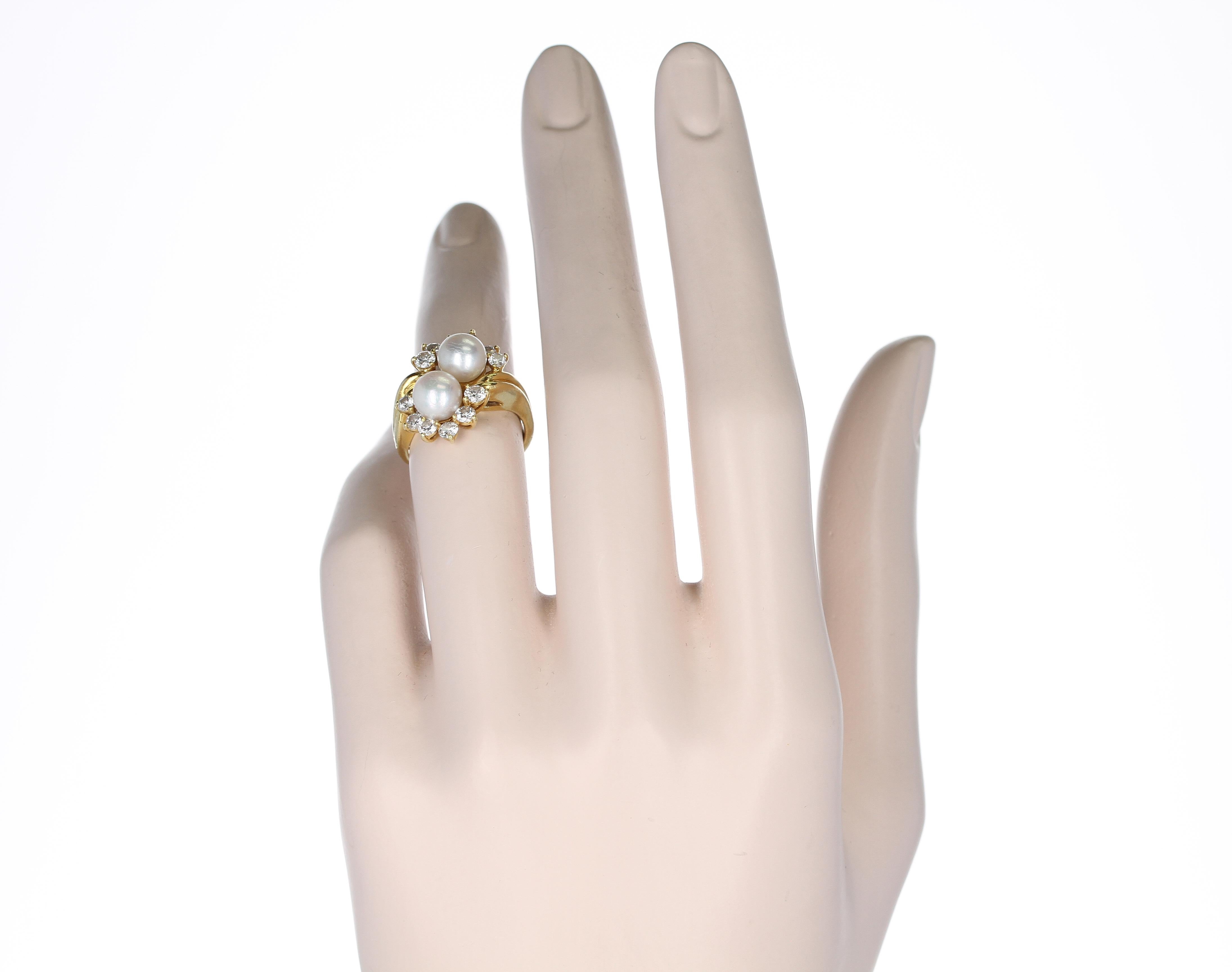 A Tiffany & Co. Double Pearl Ring with 6 Round Diamonds each, made in 18 Karat Yellow Gold. 
Ring Size US 6.50. Total Weight: 9.38 grams.
