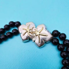 Tiffany & Co. Double-Strand Black Bead Necklace Floral Clasp 18k Gold Starfish