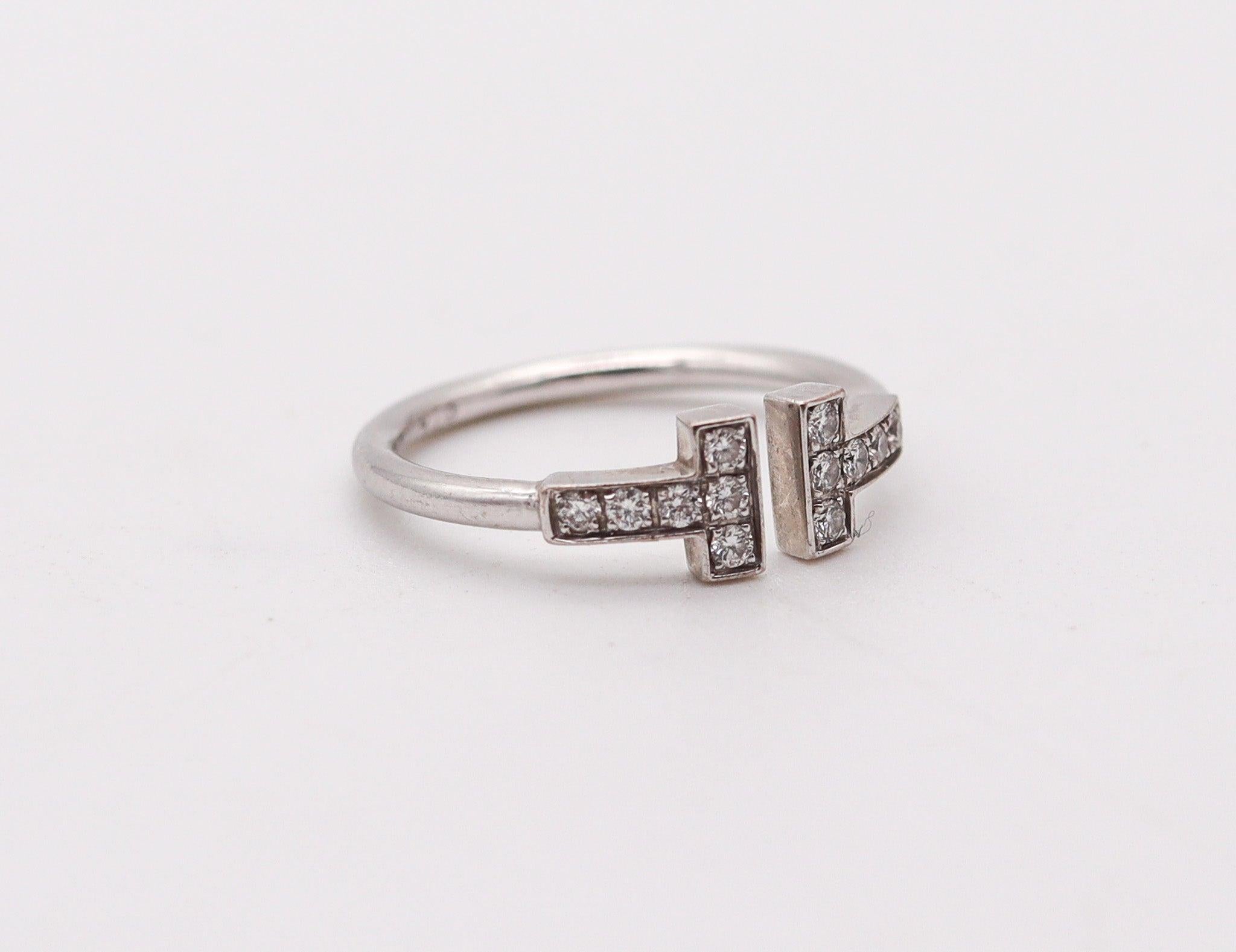 TIFFANY & CO. Double T Wire Ring In 18Kt White Gold With 12 VS Diamonds In Excellent Condition For Sale In Miami, FL