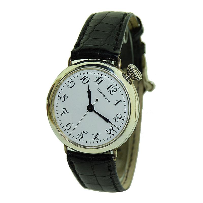 FACTORY / HOUSE: Tiffany & Co. by Longines
STYLE / REFERENCE: Military Campaign Style
METAL / MATERIAL: Sterling Silver 
CIRCA / YEAR: 1915 / 1920
DIMENSIONS / SIZE: 38mm X 36mm
MOVEMENT / CALIBER: 15Jewels 
DIAL / HANDS: Kiln Fired Enamel with