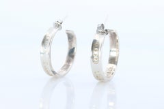 Tiffany & Co. Earrings. 1837 T and CO Hoops Sterling Silver 925 Earrings.