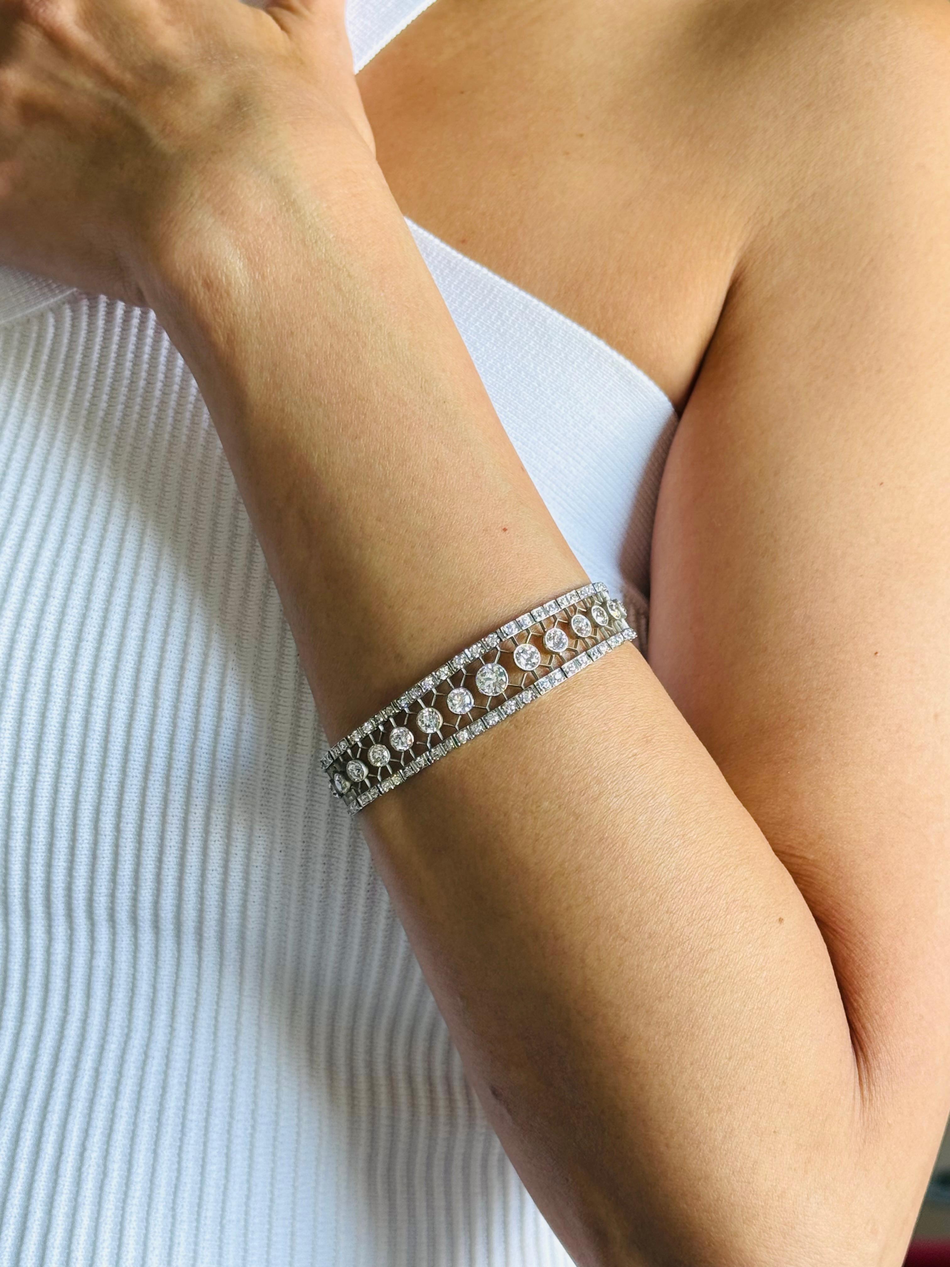 Tiffany & Co 
Edwardian Platinum Diamond Bracelet 
Of geometrical and open work design, millegrain-set with old European cut round diamonds, 
length 7 Inches , 
Hallmark stamped Tiffany & Co; circa 1910
Signed TIFFANY. 
With its original fitted case
