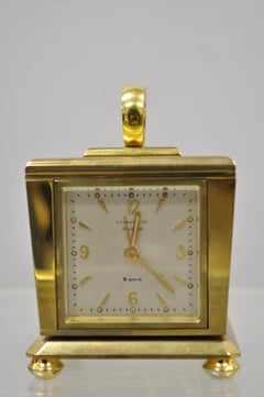 Tiffany & Co. Eight Day Brass Four Caster Revolving Small Desk Clock