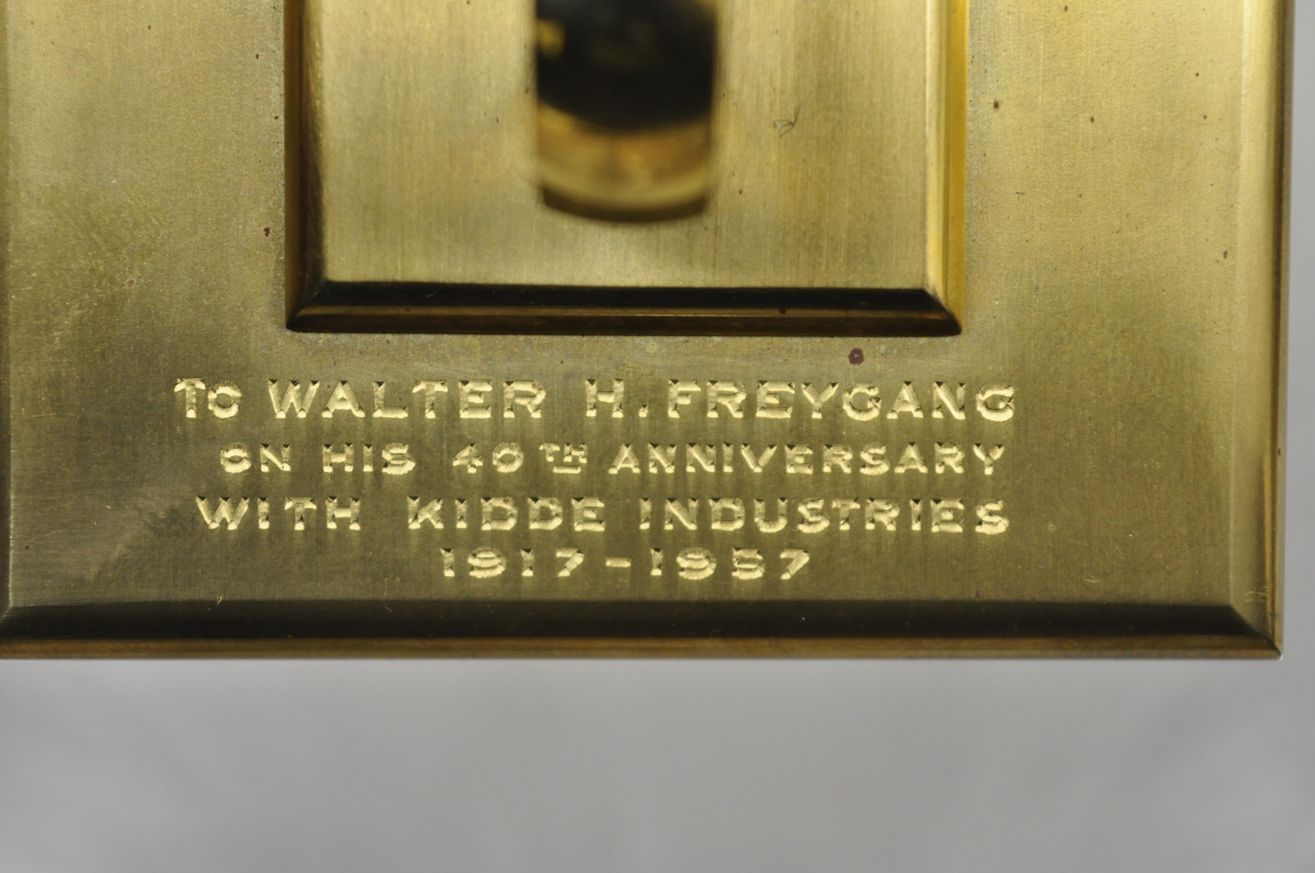 Tiffany & Co. Eight Day Brass Four Caster Revolving Small Desk Clock In Good Condition In Philadelphia, PA