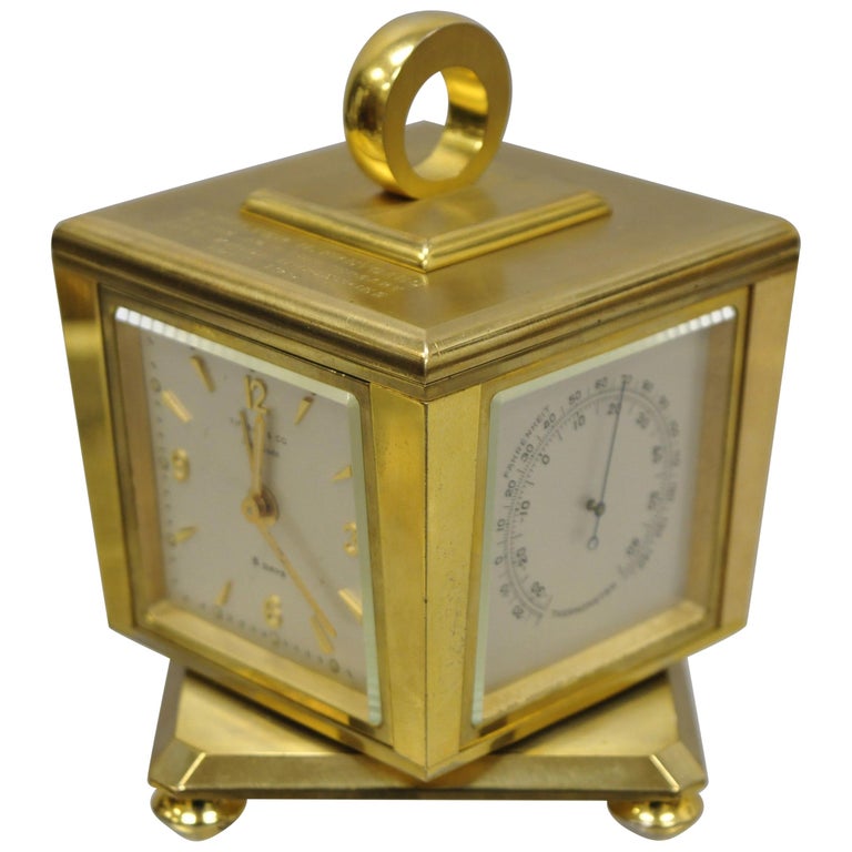 Tiffany and Co. Eight Day Brass Four Caster Revolving Small Desk Clock