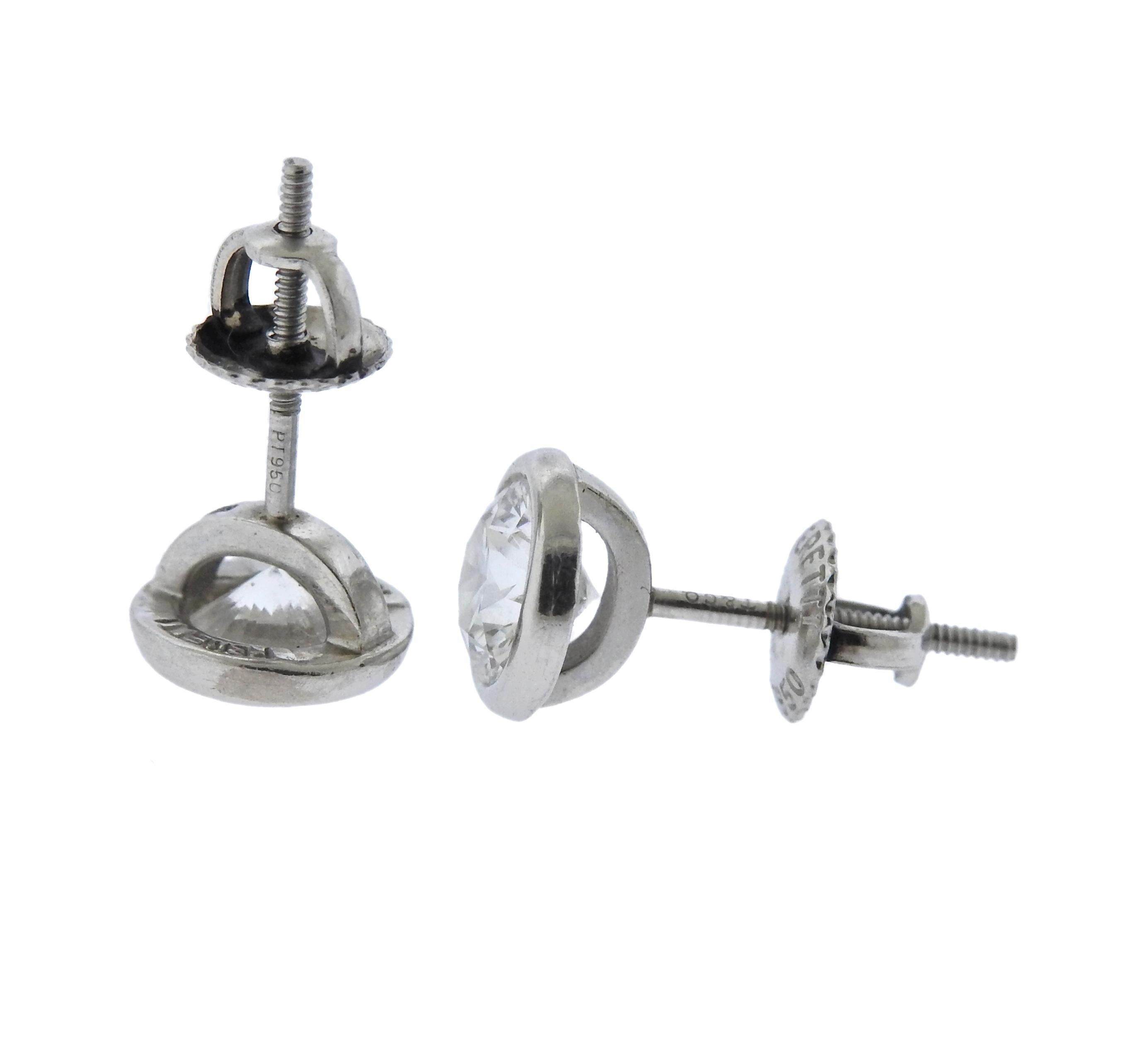  Pair of platinum bezel set stud earrings, crafted by Elsa Peretti for Tiffany & Co, set with 0.82ct and 0.80ct round brilliant diamond, both VS1/G. Earrings come with Receipt and T & Co Replacement valuation report from 2003 of $18400. Current