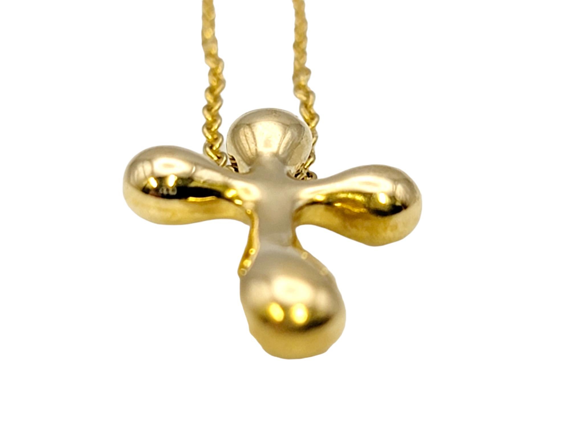 Contemporary Tiffany & Co. Elsa Peretti 18 Karat Yellow Gold Modern Cross Pendant Necklace