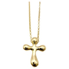 Tiffany & Co. Elsa Peretti 18 Karat Yellow Gold Modern Cross Pendant Necklace