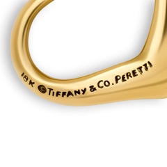 Tiffany & Co. Elsa Peretti Collier à pendentif cœur ouvert en or jaune 18 carats