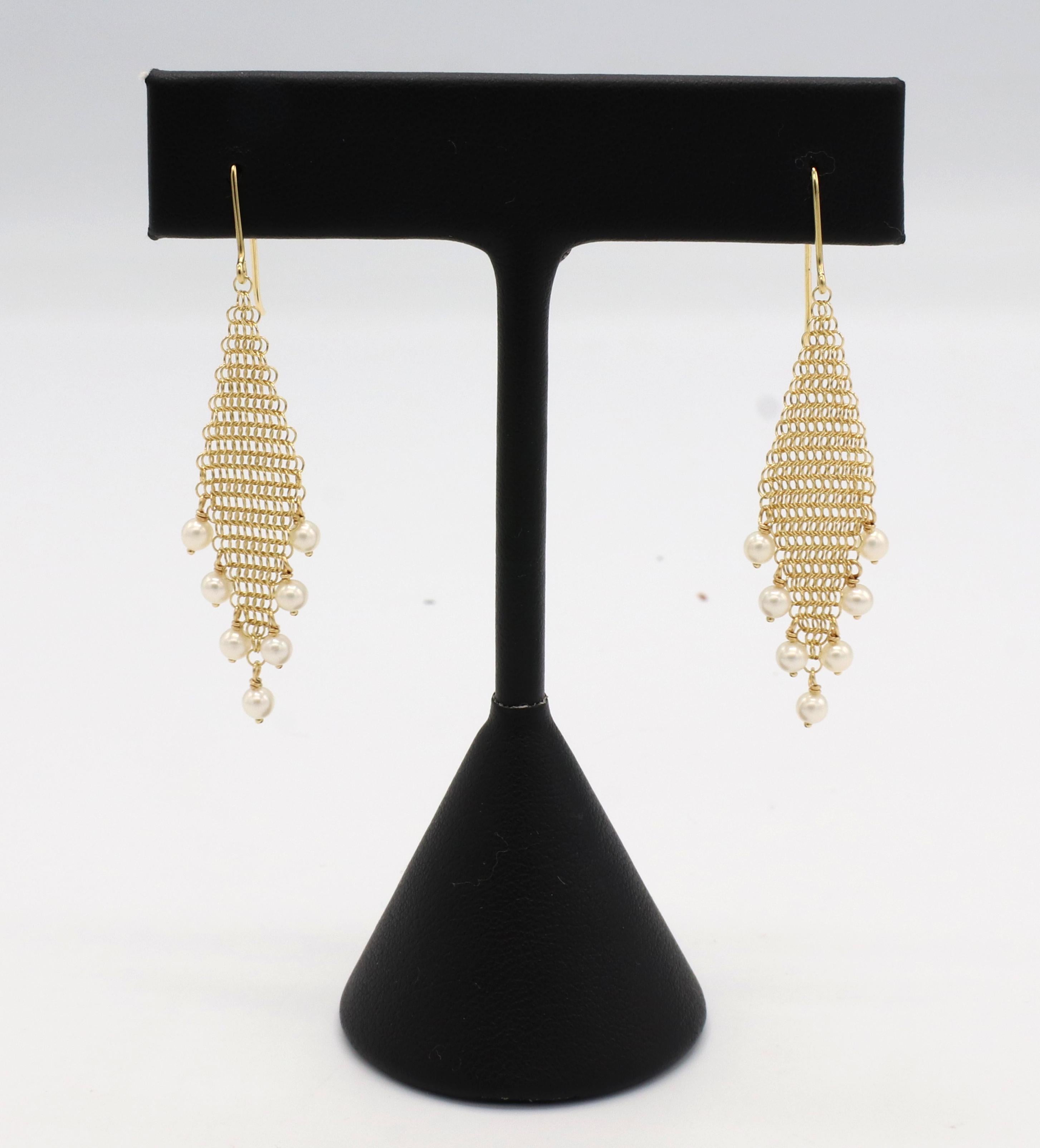 Tiffany & Co. Elsa Peretti 18 Karat Yellow Gold Pearl Mesh Fringe Drop Earrings
Metal: 18k yellow gold
Weight: 2.48 grams
Length: 40mm
Width:14mm
Pearls: 2.5-3mm
Retail: $1,050 USD

